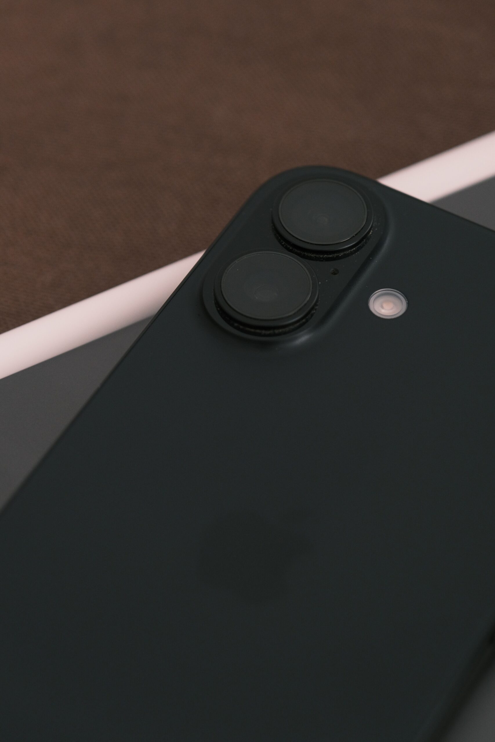 Detailed view of a dual-lens smartphone camera, perfect for tech themes.